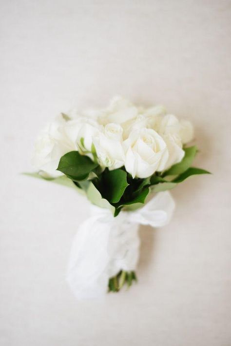 20 Small Wedding Bouquet Ideas For The Low-Fuss Bride Petite Wedding Bouquets, Petite White Rose Bouquet, Small Wedding Bouquets Bride, Small Bouquet Ideas, Minimalistic Bouquet, Getty Wedding, Minimalist Flower Bouquet, Small Wedding Bouquet, Garden Rose Bouquet Wedding