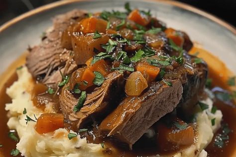 Tender pot roast served over creamy garlic mashed potatoes. A perfect comfort food recipe that’s slow-cooked for incredible flavor. Pot Roast Over Mashed Potatoes, Roast Over Mashed Potatoes, Tender Pot Roast, Pot Roast Seasoning, Creamy Garlic Mashed Potatoes, Over Mashed Potatoes, Mashed Potatoes Recipe, Creamy Mash, Pot Dinners