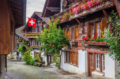 A pretty street in Brienz, Switzerland Chalet Plans, Brienz Switzerland, Lake Brienz, Lake Thun, Lakeside Village, Swiss Chalet, Waterfall Trail, Switzerland Travel, Calm Water