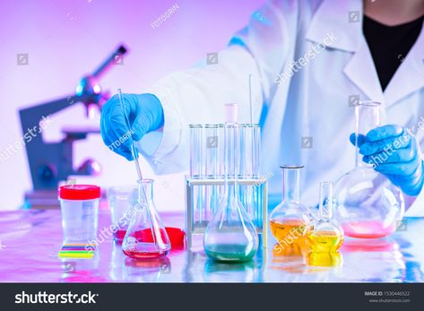 Chemistry. Mixing of chemical reagents. Chemist. A man works in a laboratory. Checking chemical reactions. Organic chemistry. Laboratory synthesis. A human mixes liquids. Career chemist. Royalty Free image photo Laboratory Background, Lab Glassware, Background Science, Chemical Analysis, Chemistry Lab, Biomedical Science, Chemistry Experiments, Women Scientists, Beauty Background