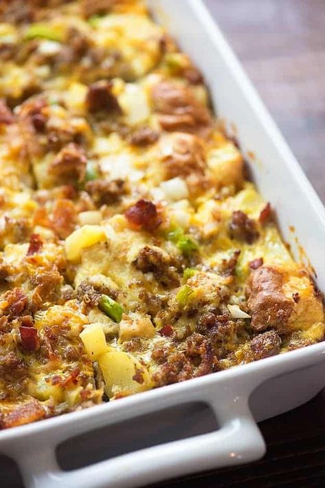 Loaded with bacon, sausage, cheddar, and eggs, this breakfast casserole is hearty and filling! Cowboy Brunch, Melted Potatoes, Breakfast Recipes Muffins, Breakfast Quick And Easy, Cowboy Breakfast, Holiday Breakfast Recipes, Brunch Savory, Brunch Ideas Recipes, Hearty Breakfast Recipes