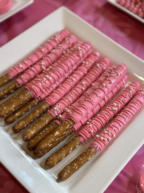 Barbie Birthday Party  | CatchMyParty.com Barbie Finger Food, Barbie Birthday Party 6, Barbie Theme Candy Table, Barbie Donut Party, Barbie Fairytopia Birthday Party, 21st Barbie Birthday Party, Barbie Birthday For Kids, Barbie Birthday Snacks, First Birthday Barbie Theme