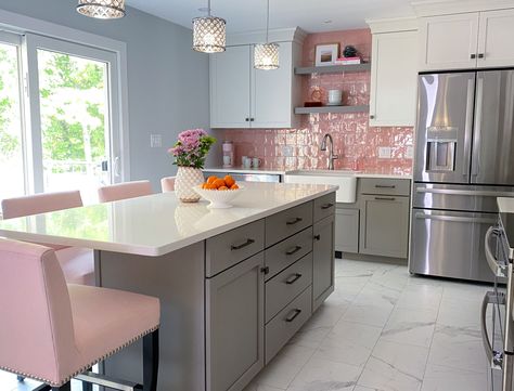 Gray and white kitchen cabinets with a pink tile backsplash. See full kitchen on our blog. #pinkkitchen #pinktiles #tilebacksplash #pinkkitchenideas #kitchendesign #openshelving Pale Pink Kitchen Backsplash, Light Pink Kitchen Tiles, Coral Backsplash Kitchen, Pink Grey Kitchen Ideas, Pink Splashback Kitchen, Pink Backsplash Kitchen Tile, Kitchen Ideas Pink And White, Pink Kitchen Backsplash Ideas, Gray And Pink Kitchen