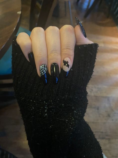 spooky halloween nails i got with a bat and a spiderweb, im obsessed! #goth #bat black nails #black #nails #spiderweb #emo #nails Black Spider Web Nails Coffin, Black Pointy Halloween Nails, Simple Goth Nail Art, How To Do A Spider Web On Nails, Spooky Nails Coffin Shape, Simple Goth Nails Almond, Halloween Spiderweb Nails, Spooky Goth Nails, Cute Bat Nails