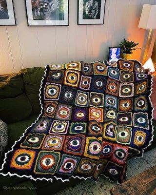 Crochet Eyeball Blanket, Quirky Crochet Blanket, Evil Eye Interior Design, Random Yarn Crochet Blanket, Third Eye Crochet, House Decor Crochet, Whimsigoth Crochet Blanket, Eye Blanket Crochet, Crochet Evil Eye Blanket