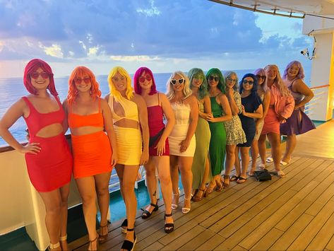 We had all the girls wear colorful dresses and matching sunglasses! Neon Wigs Bachelorette, Bachelorette Wig Night, Wig Night Bachelorette Outfit, Wig Party Outfit, Bachelorette Party Matching Outfits, Bachelorette Night Out Outfit Themes, Bachelorette 2023, Bachelorette Outfit Themes, Bachelorette Miami