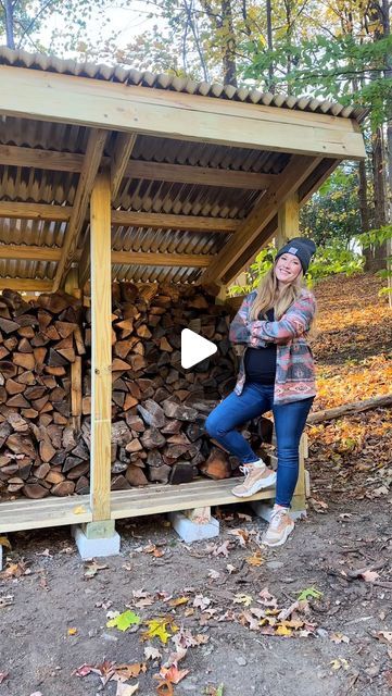 Carrie Anne | Furniture Flips & Home DIY Tips on Instagram: "We were tired of looking at our ugly wood pile, so we finally did something about it 🙌🏼 We grabbed some plans online, ordered a supplies delivery, and managed to bang it out in one weekend. Now we have this pretty storage shelter tucked into the trees, and so much more room for activities 🤗

Drop any questions you have below👇🏻" Lean To Wood Shed Firewood Storage, Outdoor Fireplace Wood Storage, Green House Ideas Diy Cheap, Wood Shed Ideas Firewood, Diy Firewood Storage Outdoor, Wood Shed Ideas, Mountain Backyard, Wood Storage Ideas, Shelters In The Woods