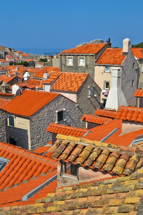 Dubrovnik, Croatia - Red tiled rooftops of the Old Town viewed from the City Walls Red Buildings, City From Rooftop, Town From Above, Old Town Architecture, Rooftop City, Dubrovnik Restaurant Old Town, Old Building, Dubrovnik, Exterior House Colors