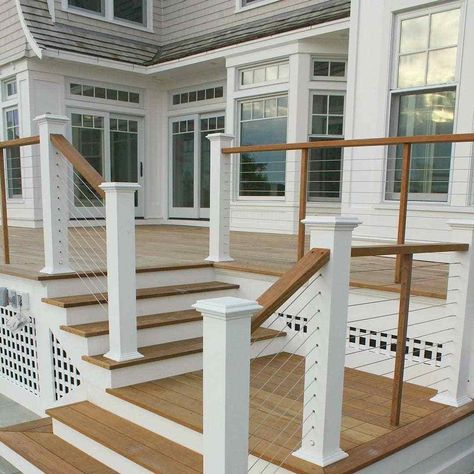 Cable Rail gives you that sleek modern look on your deck without obstructing your view. ⠀⠀⠀⠀⠀⠀⠀⠀⠀⁠ What type of Railing do you like on your deck? Glass, Aluminum or Cable? Grey Deck White Railing Porch Ideas, Cable Front Porch Railing, Rooftop Deck Railing Ideas, Deck With Horizontal Railing, Deck With A View, Front Porch Cable Railing Ideas, Front Deck Railing Ideas, Deck Without Railing, Timber Tech Deck Ideas