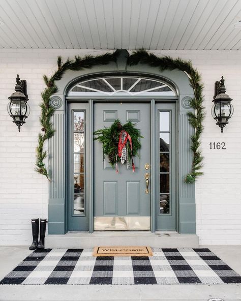 Rebekah Westover on Instagram: “Please send snow🙏🏻❄️ #whitechristmas . . . . #swcolorlove #sherwinwilliams #holidayseason #holidayhome #holidaydecor #myoklstyle…” Layering Rug, Rug Layering, Porch Mat, Plaid Rug, Welcome Door Mat, Farmhouse Front Porches, Christmas Front Porch, Christmas Front Doors, Fall Front Porch