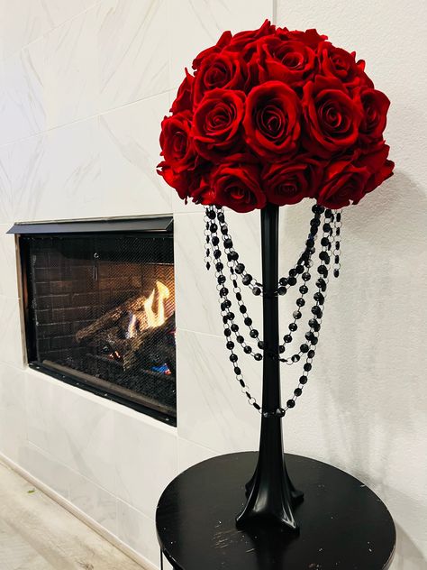 This beautiful handmade red flower rose centerpiece is a Stunning and the center of attention.  The roses are vibrant and lifelike.  The centerpiece floral is draped with black crystals and on glass black Eiffel Tower vase.  25 inches H X 15 inches W Shipping: We ship 1-2 weeks after the purchase: If you need to expedite your order please ask.  Please contact me with any questions! Email: info@shopjuelzjems.com Black Red Centerpiece, Red And Black Roses Centerpieces, Red And Black Centerpieces For Party, Red Black Centerpieces, Black And Red Centerpieces Wedding, Eiffel Tower Vase Centerpieces Ideas, Diy Rose Centerpiece, Red Black And Gold Centerpieces, Roses Centerpieces Ideas