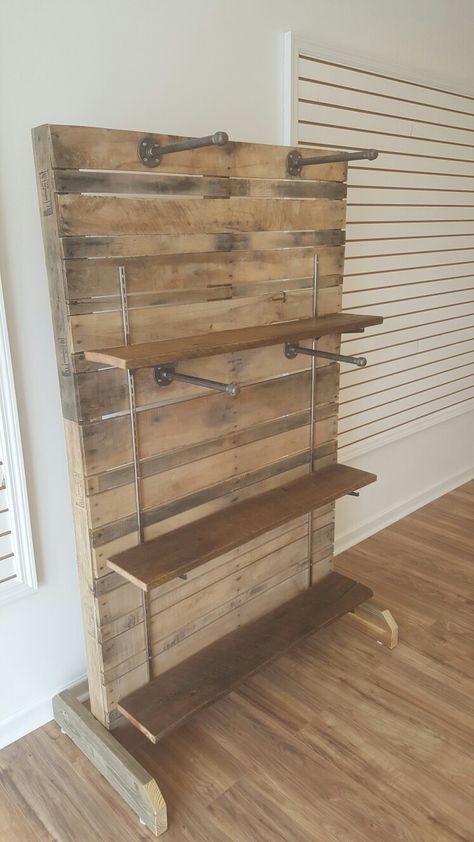 Retail Display Racks Pallet Wall Display Retail, Clothing Rack Store Display, Retail Display Wall Ideas, Retail Boho Store Displays, Diy Store Shelving Display, Retail Hanging Display Ideas, Boutique Clothing Displays Small Spaces, Rustic Clothing Display, Pallet Retail Display