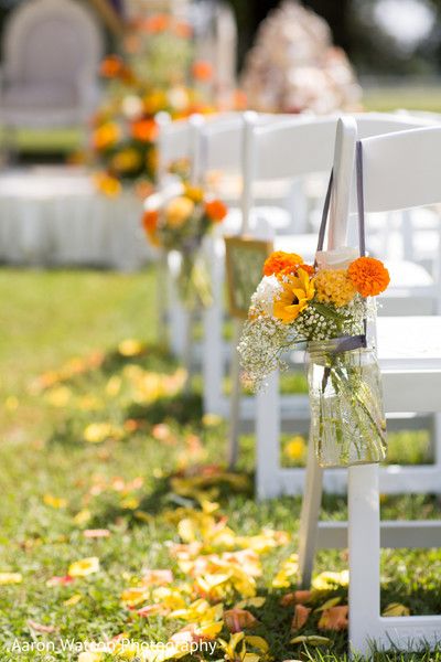 Lovely wedding aisle floral and decor http://www.maharaniweddings.com/gallery/photo/100620 Decorate Isle For Wedding, Outdoor Wedding Aisle Entrance, Simple Fall Wedding Ceremony Decor, End Of Wedding Aisle Decor, Fall Isle Wedding Decor, Summer Wedding Aisle, Simple Fall Wedding Aisle Decor, Flowers Lining Aisle Wedding, Rustic Wedding Aisle