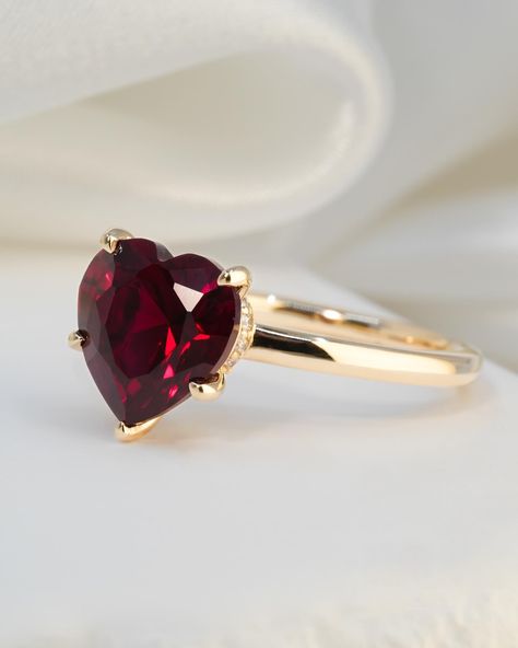 Will rubies be the stone of the summer?? The heart shaped detail on this Jolie e-ring is sooo dreamyyy. ♥️ #DoAmore #jewelry #ruby #diamond #engagementring #luxury #trending #aesthetic #finejewelry #heart Trending Aesthetic, Jewelry Ruby, Ruby Diamond, The Stone, Heart Shapes, Ruby, Fine Jewelry, Engagement Rings, Ring