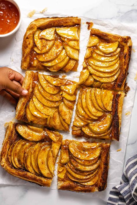 This Easy Puff Pastry Apple Tart is seasonal, simple, and scrumptious! Store-bought puff pastry crust makes this dessert quick, easy, and approachable for even the most novice of home cooks. And just look how gorgeous it is!?! Savoury Puff Pastry Tart, Best Apple Tart Recipe, Apple Crisp With Puff Pastry, Apple Tart Recipe Puff Pastry, Apple Puffed Pastry Recipes, French Apple Tart Puff Pastry, Apple Tart Tatin Puff Pastry, Apple Phyllo Dough Recipes, Apples Puff Pastry Recipes