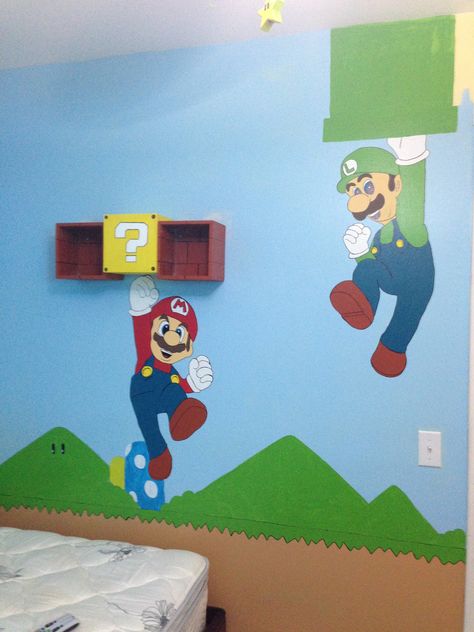 Mario themed kids room. Question mark shelf opens for a special hiding spot. Mario Art Painting, Super Mario Themed Bedroom, Super Mario Kids Room, Mario Room Ideas, Super Mario Room Decor, Super Mario Bedroom Ideas, Mario Bedroom Ideas Boys, Mario Room Ideas Boys, Mario Themed Bedroom