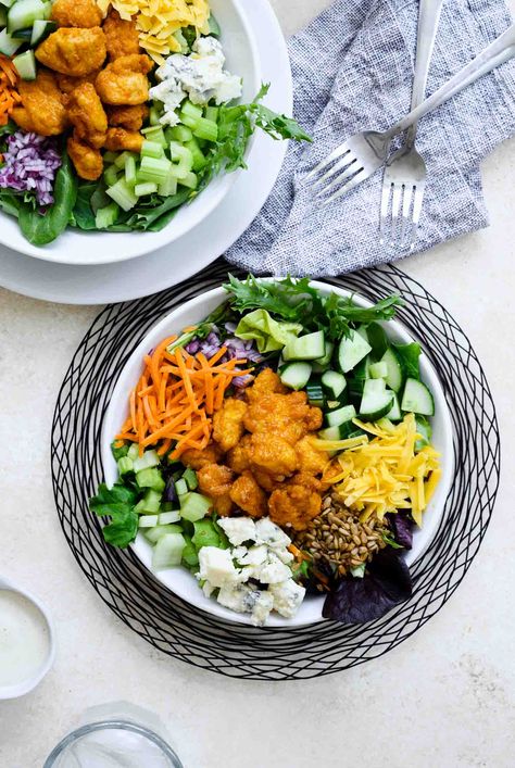 This easy salad recipe can be made for 1 or as many as you want. Uses copycat Chick-Fil-A chicken nuggets to make a Buffalo chicken nugget salad. Chicken Nuggets Salad, Chicken Nugget Salad, Diy Salad Bar, Air Fried Chicken Nuggets, Fried Chicken Nuggets, Copycat Chick Fil A, Easy Buffalo Chicken, Frozen Chicken Nuggets, Buffalo Chicken Pizza