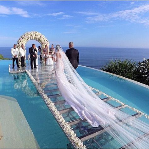 Beautiful ocean seaside wedding  Aisle is glass over water of infinity pool.  Location: Tropical island in Caribbean or pacific ocean... maybe Maldives or Hawaii  “Tag your love ❤️ | Photo: ©️️Monica Hannoun | Follow /lux/.toys” Pool Wedding, Walk Down The Aisle, Water Wedding, Beach Ceremony, Bali Wedding, Seaside Wedding, Wedding Goals, Wedding Aisle, Wedding Cake Designs