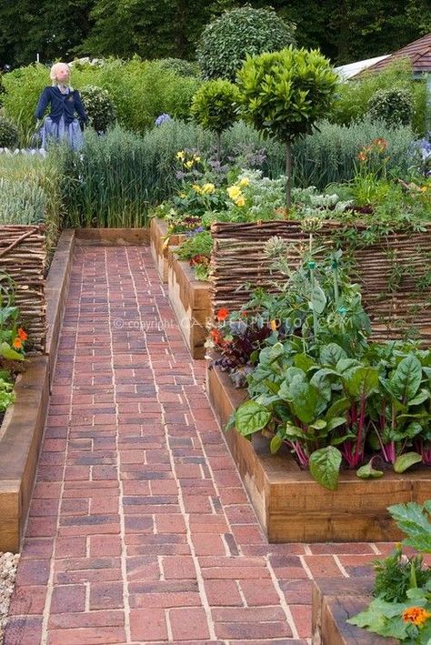 Beautiful vegetable garden - I'd love to do something like this on a large scale in our garden, so we aren't fighting the weeds in the paths and so we get more warmth to the plants at the beginning and end of the season. Brick Pathway, Brick Path, Brick Walkway, Potager Garden, Garden Walkway, Veg Garden, Hydroponic Gardening, Plants And Flowers, Veggie Garden