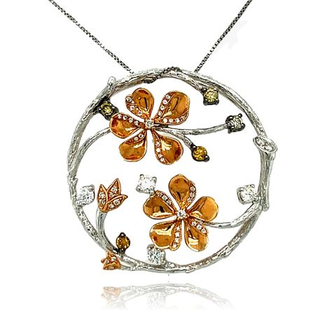 This elegant Floral pendant has fancy colored diamonds set in 18K White and Rose Gold. Gold Chain is included. Pendant is brand new with detailed tags attached. This pendant comes in a beautiful box ready for the perfect gift.  18kt gold: 6.50 gms Fancy Diamonds: 5 round, 0.23 cts White Diamonds: 51 brilliant cut round, 0.42 cts Retail Value: $3.950 Free shipping! Usually ships within 1-2 business days! Fancy Diamond Pendant, Egyptian Inspired Jewelry, Temple Jewellery Earrings, Diamond Flower Pendant, Jewellery Design Sketches, Yellow Gemstones, Jewellery Earrings, Floral Pendant, Fancy Diamonds