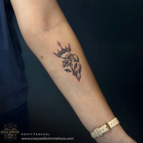 Fine line lion with crown Tattoo for girls by Rohit Panchal Small Female Lion Tattoo, Lioness With A Crown Tattoo, Lion With Crown Tattoo Design For Women, Female Tiger Tattoo For Women, Minimal Lion Tattoo For Women, Lion Tattoo Crown, Lion Crown Tattoo, Lion Tattoo Girls, Small Lion Tattoo For Women