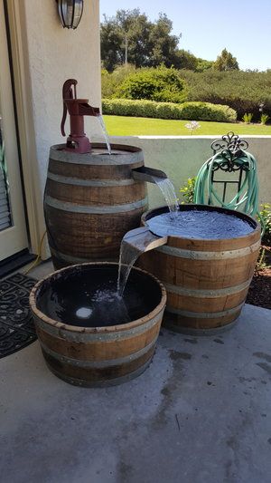 Wine Barrel Water Feature, Wine Barrel Diy, Barrel Fountain, Wine Barrel Decor, Barrels Diy, Wooden Barrels, Whiskey Barrel Furniture, Barrel Projects, Wine Barrel Furniture