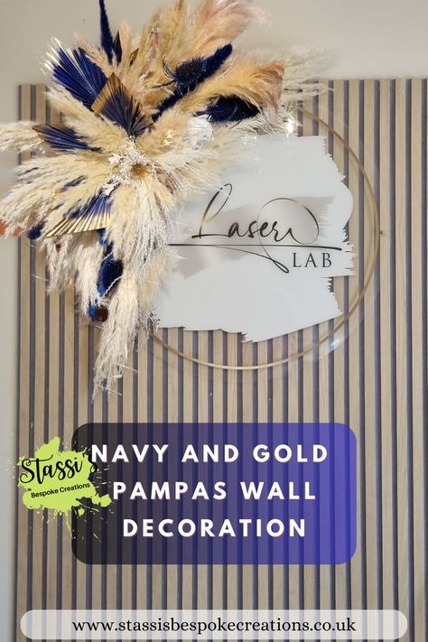 navy blue dried sun palm, navy blue speared palms, in a pampas grass, wall decoration hung next to a salon sign. Navy And Gold Beauty Salon, Blue Salon Decor, Pampas Mirror, Wall Decor Salon, Pampas Wall Decor, Pampas Wall, Flatten Stomach, Blue Pampas, Mirror Framing