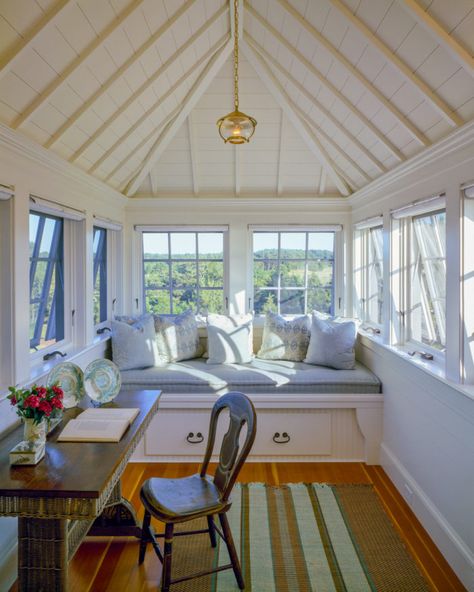 Windows on all three sides bring in lots of sun and freshening breezes, and a built in window seat provides a nice spot to stretch out. Bead board wainscoting and a board and batten ceiling complete the detailing in the little room - Fine Homebuilding Nantucket Interior, White Sunroom, Home Conservatory, Beach House Vibes, Bayou House, Pinterest House, Built In Daybed, Attic Windows, Conservatory Interior