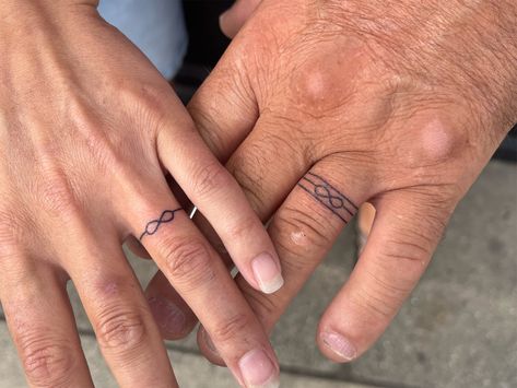 Ring Designs Tattoo, Men’s Ring Tattoo Designs, Wedding Band Tattoo Men, Infinity Band Wedding Ring, Wedding Ring Tattoos, Wedding Band Tattoo, Ring Tattoo, Wedding Ring Tattoo, Tattoo Wedding Rings