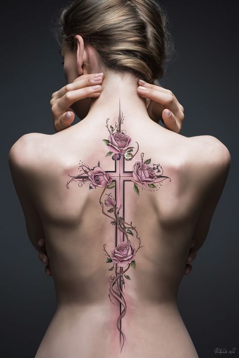 Discover stunning spine tattoos for women that beautifully incorporate the Cross, offering a unique and meaningful expression of faith. These delicate designs often feature elegant elements like flowers and butterflies, perfectly complementing the spine’s natural shape. Explore simple yet impactful tattoo ideas that reflect your spiritual journey. Whether you're drawn to dainty styles or bold red and black contrasts, find inspiration to create a tattoo that resonates deeply with you. Back Tattoo Women Spine Spiritual, Angel Spine Tattoos For Women, Unic Tattoo Women, Cross Hip Tattoo, Unique Cross Tattoos For Women Beautiful, Spine Tattoos Rose, Cross Spine Tattoos For Women, Back Tattoo Women Spine Meaningful, Christ Tattoo Women