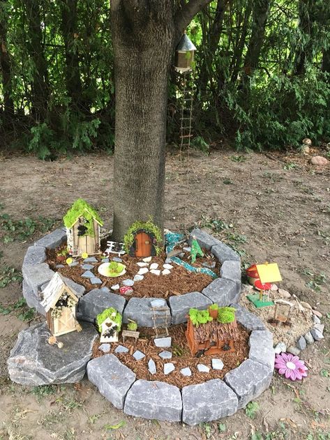 Fairy Garden Stone House Diy, Fairy Front Yard, Fairy Garden Neighborhood, Large Garden Ideas Landscaping Backyards, Tree Area Ideas, Porch Crafts Diy, Fairy Garden In Backyard, Fairy Garden Ideas Around Tree, Fairy Garden Around A Tree