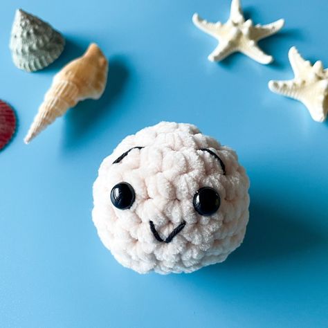 *** Meet 𝗢𝗽𝗵𝗲𝗹𝗶𝗮 𝘁𝗵𝗲 𝗢𝘆𝘀𝘁𝗲𝗿, your gateway to cuteness! *** This beginner-friendly crochet pattern lets you create adorable under-the-sea friends. Whip up this adorable oyster in any yarn you choose - let your creativity flow! ✨ 𝗧𝗵𝗲 𝗯𝗲𝘀𝘁 𝗽𝗲𝗮𝗿𝗹-𝗳𝗲𝗰𝘁 𝗽𝗮𝗿𝘁? Embroider all sorts of expressions on her pearl - happy, sad, sassy, you name it! Ophelia the Oyster pattern is officially here! Grab your pattern on Etsy (link in bio) or head over to Hobbii to make your ocean critters come to life! Let's ... Crochet Oyster, Oyster With Pearl, Sea Crochet, Crochet Sea Creatures, Crochet Friends, You Name It, Sewing Class, Sea Creatures, Name It