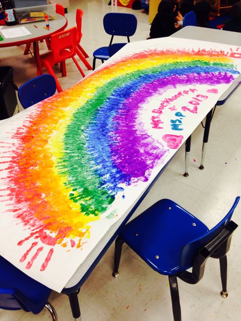 Great preschool art project to go along with the Color theme ! Use washable paints and have children dip one hand in, then rub them together. Hold their hands and place them in the arch shape until no paint remains. Repeat with each student and each child gets a chance! Let each color dry for 5 min before starting the next . Fun and easy . Ms.P معرض فني, Preschool Art Projects, Preschool Colors, Arch Shape, Preschool Graduation, Cool Art Projects, Rainbow Theme, Collaborative Art, School Art Projects