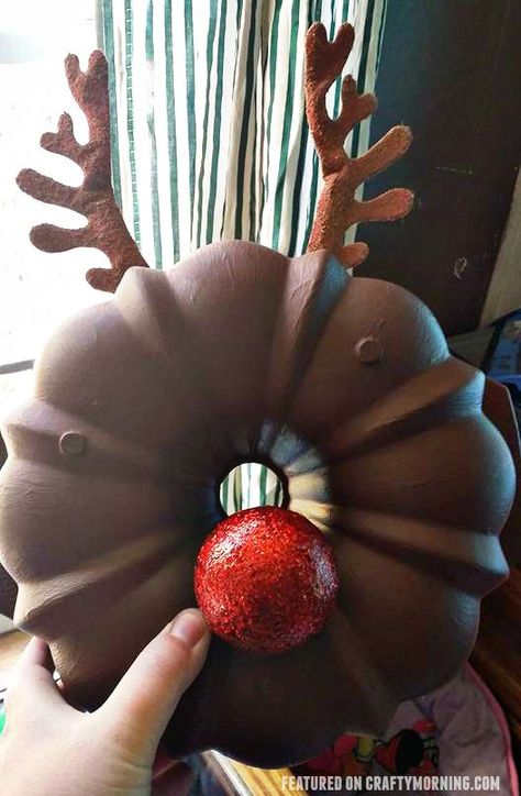 Bundt cake pan rudolph the reindeer christmas wreath...such a fun craft! #christmas #christmaswreaths #wreaths #bundtcakepanideas #rudolphideas #christmasdecor #christmasdoordecorations #craftymorning Bundt Pan Christmas Crafts, Bundt Cake Pan Crafts, Repurposed Bundt Pan, Bundt Cake Pan Pumpkin Craft, Bundt Pan Crafts Ideas, Bundt Pan Crafts, Bundt Pan Pumpkin Craft, Mop Gnomes, Reindeer Crafts