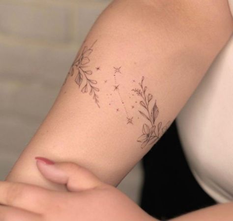 Vine Minimalist Tattoo, Celestial Bracelet Tattoo, Leaves And Stars Tattoo, Constellation Wrap Around Tattoo, Banded Tattoos For Women, Lower Arm Vine Tattoos For Women, Stars And Vines Tattoos, Celestial Arm Band Tattoo, Minimalist Wrap Around Tattoo