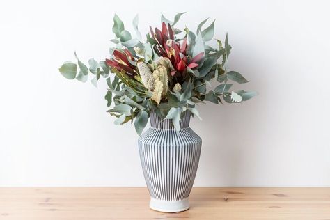 In this guide, we outline the best tall flowers for arrangements and how to arrange flowers in a tall vase. Flowers For Arrangements, Tall Vase Arrangements, Arrange Flowers, Long Stem Flowers, Tall Flowers, Tall Vase, Floral Tape, Vase Arrangements, Metal Vase