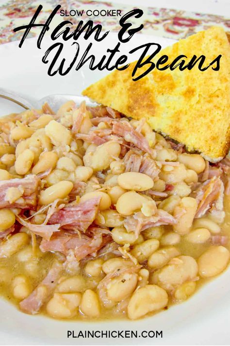 Slow Cooker Ham & White Beans - our favorite way to use our leftover holiday ham! Only 3 ingredients - ham, onion, and dried great northern beans. Cover with water and cook. Serve with some homemade cornbread. Comfort food at its best! #southern #crockpot #leftoverham #slowcooker #hambone Crockpot Ham And Beans, Beans Recipe Crockpot, Beans And Ham, Beans And Cornbread, Beans In Crockpot, White Bean Recipes, Chicken Crockpot Recipes Healthy, Slow Cooker Ham, Vegetarian Crockpot Recipes