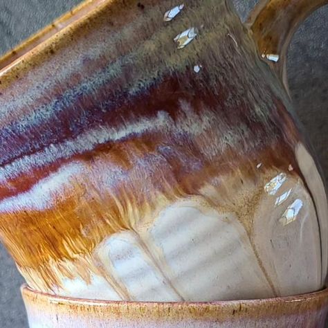 Kelsey Schroeder on Instagram: "One of my current favorite glaze combinations 🔥 this is @amacobrent honey Flux as a base with bands of deep firebrick, deep sienna speckle, and Albany slip brown (from top to bottom). Love that subtle icy blue that comes out over the firey tones below . . . . #howiamaco #honeyflux #fireandice #pottery #ceramicartist #glazedpottery #glazecombinations" Amaco Deep Firebrick Combinations, Soda Fired Ceramics, Deep Sienna Speckle Glaze Combinations, Orange Glaze Combinations, Firebrick Glaze Combinations, Albany Slip Brown Glaze Combinations, Honey Flux Glaze Combinations, Albany Slip Brown, Glaze Layering