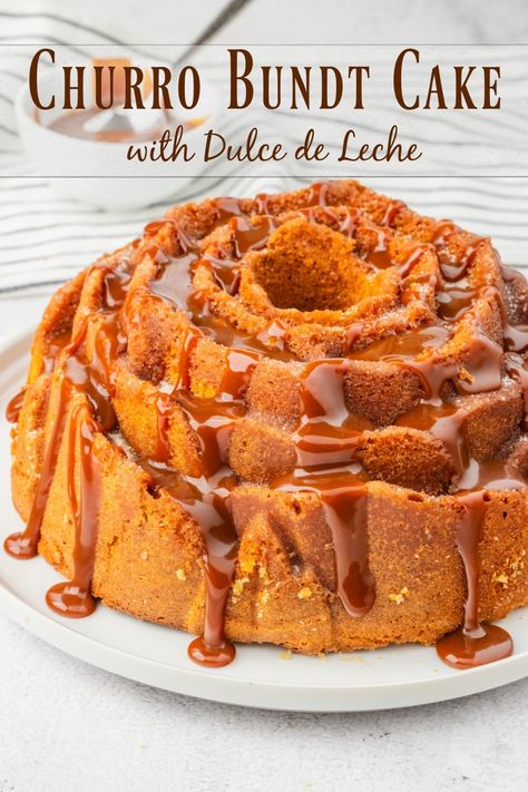 Churro Bundt Cake, the love child of two favorite desserts (churros and cake) baked into one delicious treat and drizzled generously with ribbons of sticky dulce de leche and sprinkled with crunchy cinnamon sugar topping. Every bite of this dessert will remind you of the state fair.  via @cmpollak1 Churro Cake, Red Birthday Cakes, Winter Dessert Recipes, Lemon Bundt Cake, Mini Bundt Cakes, Popular Desserts, Winter Desserts, Sugar Cake, Bundt Cakes Recipes