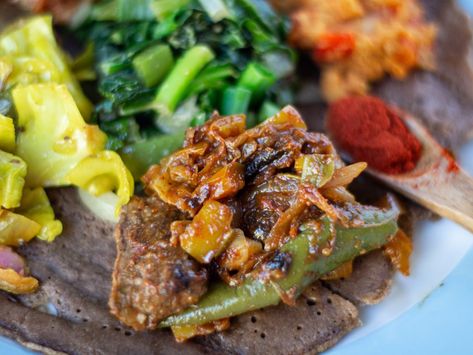 Siga Tibs, also known as Beef Tibs, is a deliciously sweet and spicy stewed beef dish that comes from Ethiopia Tibs Ethiopian, Sauteed Collard Greens, Ethiopian Recipes, Stewed Beef, Ethiopian Cuisine, Sauteed Cabbage, Food Beef, Beef And Cabbage, Ethiopian Food