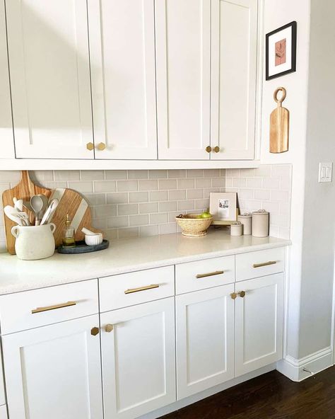 White Shaker Cabinets Showcase Gold Hardware - Soul & Lane Kitchen Cabinets Gold Hardware, Kitchen Cabinets With Gold Hardware, White Kitchen Hardware, 2 Tone Kitchen Cabinets, Cabinets With Gold Hardware, White Kitchen Cabinet Hardware, Cabinet Hardware Ideas, White Cabinet Hardware, Shaker Cabinets Kitchen