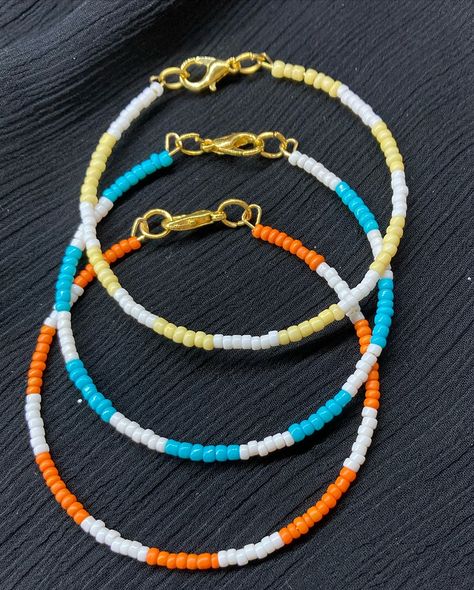 “For the queen who loves simplicity and style: minimalist beaded bracelets.” Color #pink #skyblue #yellow #black #orange #blue #goldyellow #minimalism #minimalist Small Beads, Style Minimalist, Beads Necklace, Black Orange, Jewelry Store, Yellow Black, The Queen, Jewelry Stores, Blue Sky