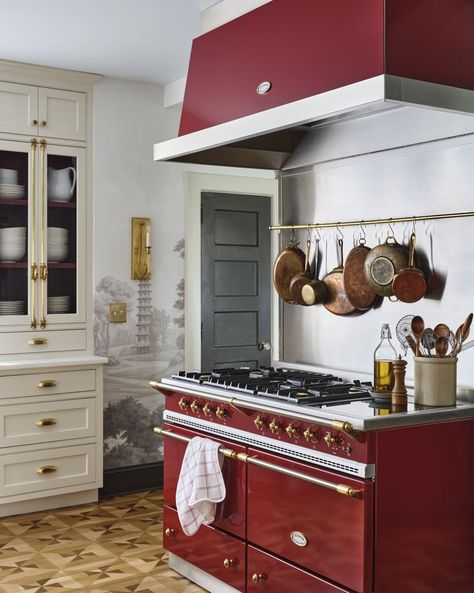 Think of the burgundy stove as the lipstick on classic ivory cabinetry. Wooden Cottage, Beautiful Kitchen Designs, Space Storage, Blue And White Vase, Kitchen Oven, Range Cooker, 50 Plus, Modern Kitchen Cabinets, White Cabinetry