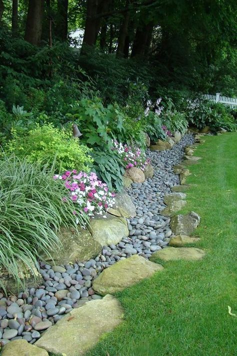 11 Attractive Landscape Drainage Solutions | Fra-Dor Tips Dry Creek Bed Ideas, Swales For Drainage, Drainage Swale Landscaping, Backyard Water Drainage Ideas, Yard Erosion Solutions, Rock Bed Drainage, Landscape Ideas For Drainage, Ditch Landscaping Roadside, Landscape For Water Drainage