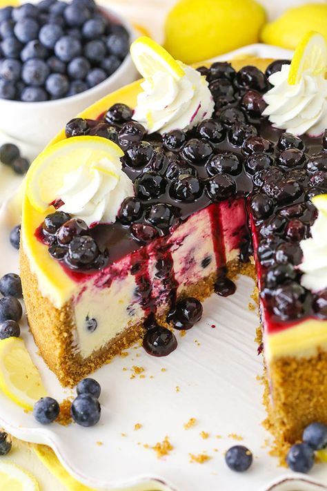 This homemade Lemon Blueberry Cheesecake recipe is creamy and flavored with tangy lemon and blueberries throughout! It's topped with a homemade blueberry sauce! A must try cheesecake recipe. Best Homemade Cheesecake Recipe, Homemade Cheesecake Recipes, Biscotti Cheesecake, Lemon And Blueberry, Blueberry Cheesecake Recipe, Lemon Blueberry Cheesecake, Savory Cakes, 귀여운 음식 그림, Homemade Cheesecake