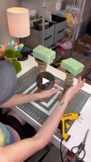 154K views · 9.2K reactions | 📣VOLUME UP📣

Candlestick arrangements can be so FUN! Let’s make two for Easter in this speedy video! 

👉🏼codyslinks.com | By How I See It Blog, LLC | Let's talk about Candlesticks
today. Y'all it's Cody here with How I See It where I
inspire you every day to see the world how I see it. I'm
going to be making two different size candlestick
arrangements today. Using some foam and some moss bunnies.
Super cute. I'm going to be working on these. I hope you
guys enjoy this. I'll be giving you guys some tips and tricks
as we're moving along. You guys can always speed up or slow
down this video. Watch as many times as you like. But I'm just
gluing on my bunny rabbits to the top of my little foam piece
here. You can find candlesticks at a variety of different craf Candlestick Arrangements, Christmas Floral Arrangements Diy, Holiday Centerpieces Diy, Easter Floral Wreath, Care Bear Birthday, Candle Stick Decor, Easter Spring Wreath, Easter Goodies, Christmas Floral Arrangements