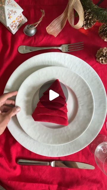 Manuela Mazzocco on Instagram: "✨Christmas Tree Napkin Fold✨ One more way to showcase the magic of the season❤️ This simple yet enchanting fold can add a sprinkle of joy to your holiday celebrations😘 Merry Christmas 🎄  #napkinfold #tutorial #howto #napkin #tabledecor #holidaytable" Napkin Folded Like Christmas Tree, Napkin Christmas Tree Folding, Christmas Tree Napkin Folding Tutorials, Fold Napkin Like Christmas Tree, Easy Christmas Napkin Folding, Fancy Napkin Folding Tutorials, Christmas Napkin Folding Paper, Winter Napkin Folding Ideas, Xmas Napkins Ideas