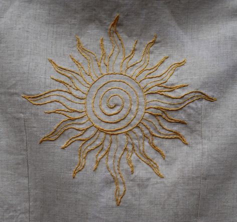 This is the back of our last “Alma” top. Don’t you love the sun? 🌞 Now available on our website! #sunembroidery #pastranadepastrana #handsewnclothing #handembroidery #linenclothing #embroideredtop #yellowembroidery Greek God Embroidery, Embroidery Around Neckline, Greek Mythology Embroidery, Sun Moon Embroidery, Sun Embroidery Design, Embroidery Aesthetic Vintage, Sun Embroidery Pattern, Sun And Moon Embroidery, Tote Embroidery