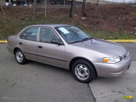 1998 Misty Plum Pearl Metallic Toyota Corolla VE #47113037 Photo #2 | GTCarLot.com - Car Color Galleries Corolla 1998, Beige Interior, Car Colors, Photo Archive, Metallic Colors, Toyota Corolla, House Colors, Plum, Photo Galleries