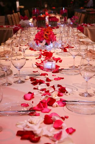 Rose petals make a beautiful floral table runner. Rose Petals On Table, Rose Petals Wedding Table, Spring Wedding Color Palette, Rose Petals Wedding, Beer Wedding, Hot Pink Weddings, Vegas Weddings, Flower Confetti, Red And Pink Roses